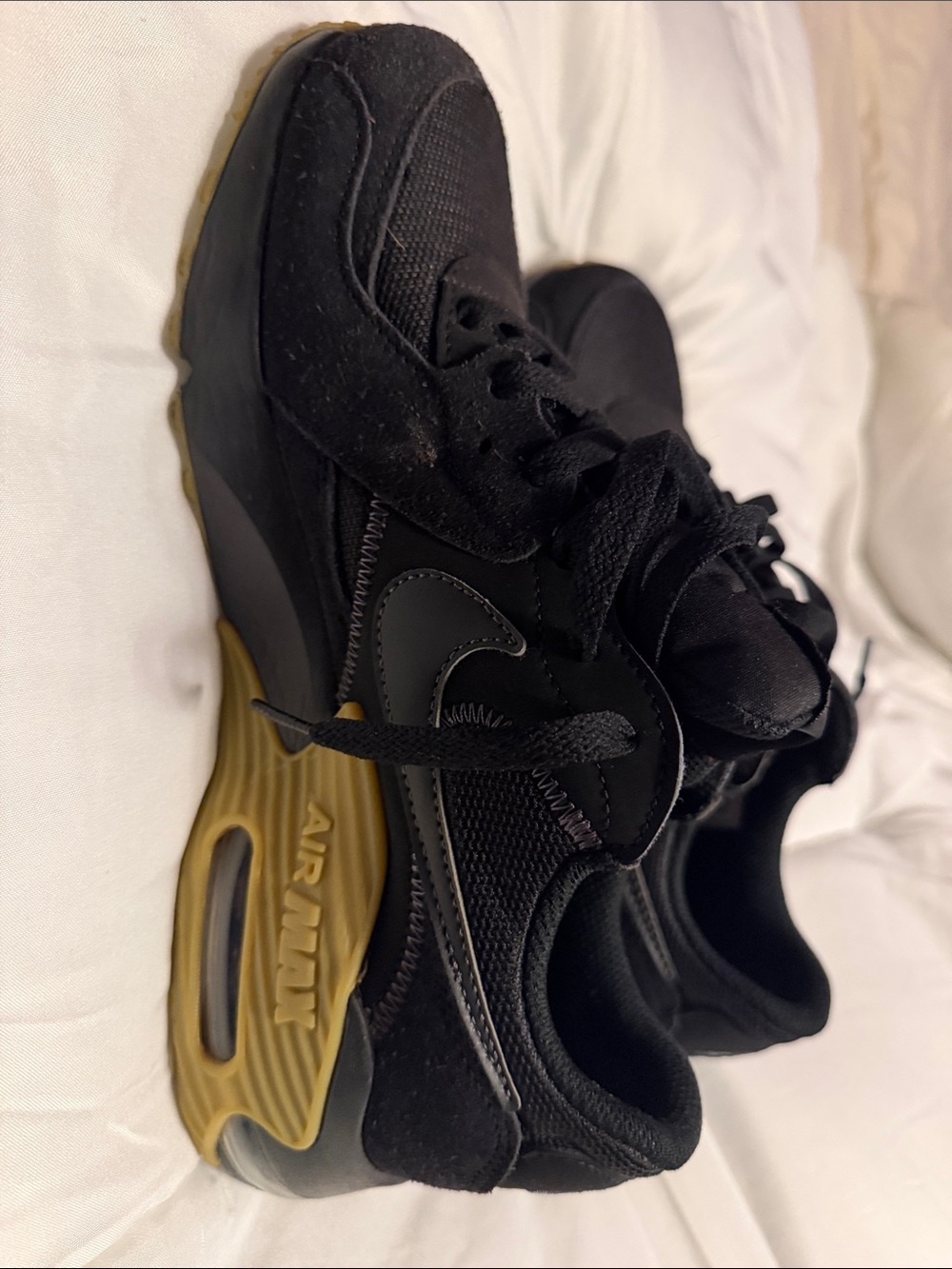 Nike Men’s Black Sneakers with Gold Accent